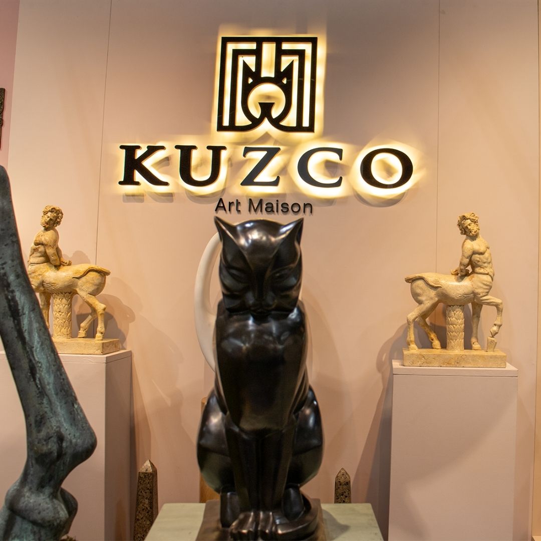 Handmade Art Deco bronze sculpture of a purring cat with graceful curves