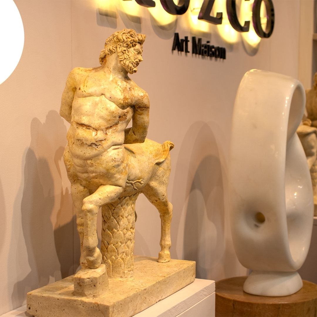Hand-carved travertine marble Borghese centaurs sculpture displayed at Maison et Objet exhibition