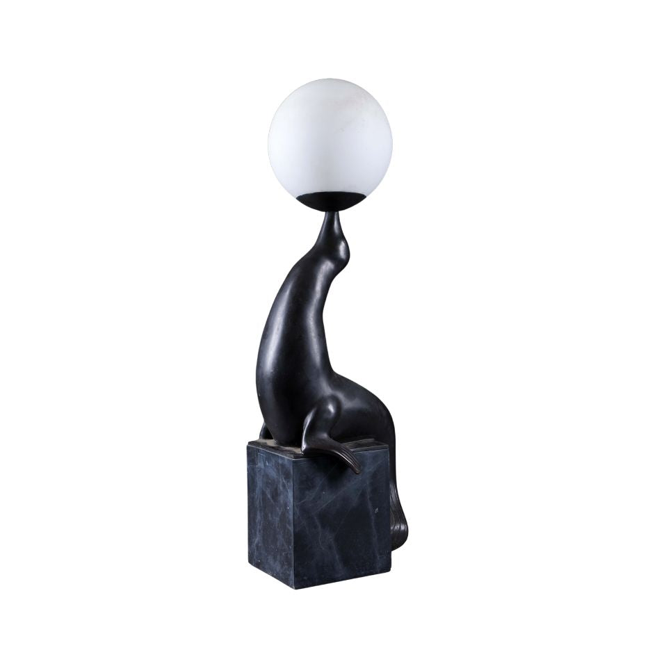 Art Deco bronze table lamp, seal juggling ball, dark brown patina, black marble base
